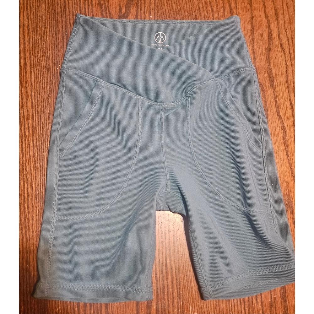 Move Theology Woman's High Waisted Ribbed Biker Shorts
